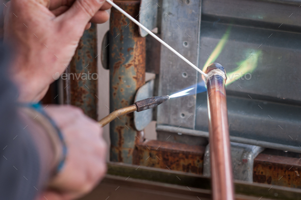 Welding of copper pipe.