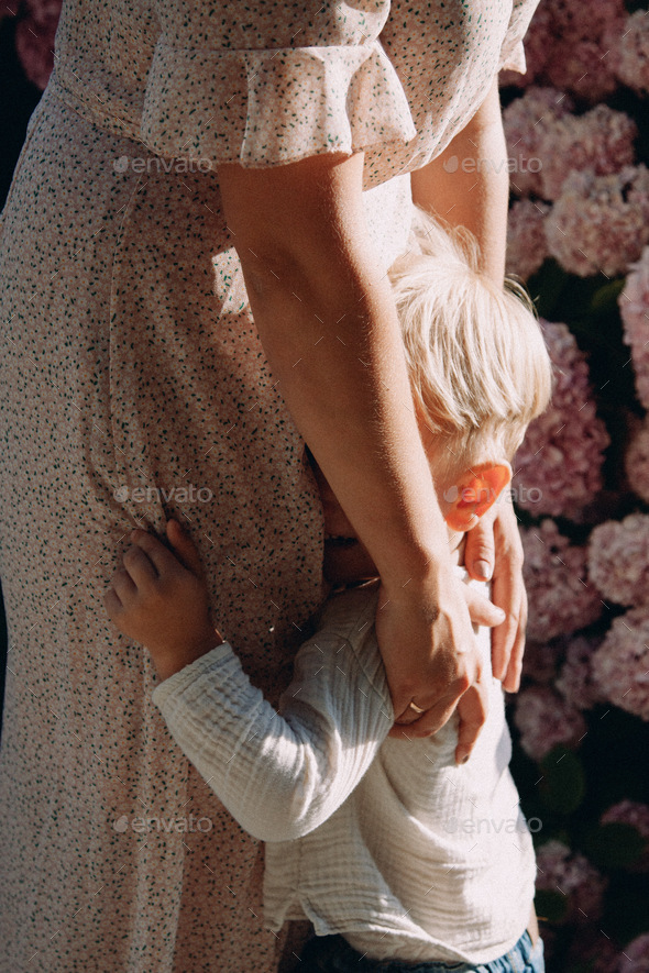 mom hugs son, kindness and hugs - Stock Photo - Images