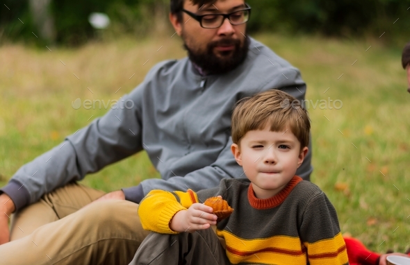Father and son have fun together at a picnic in nature card for the holiday son\'s day