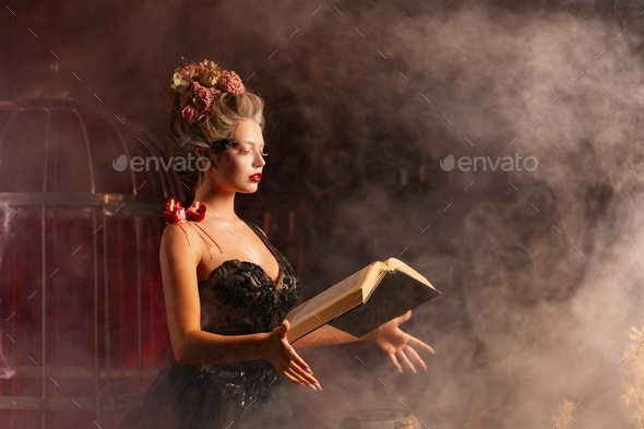 Good Witch. Mystic woman use Spell book fire flame spell, Halloween background