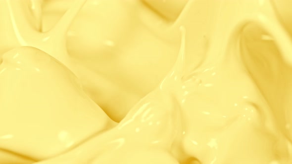 Super Slow Motion Shot of Pouring and Splashing Banana Milk at 1000Fps. alt