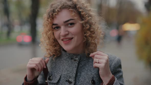 Happy Woman Smiling Funny at Camera