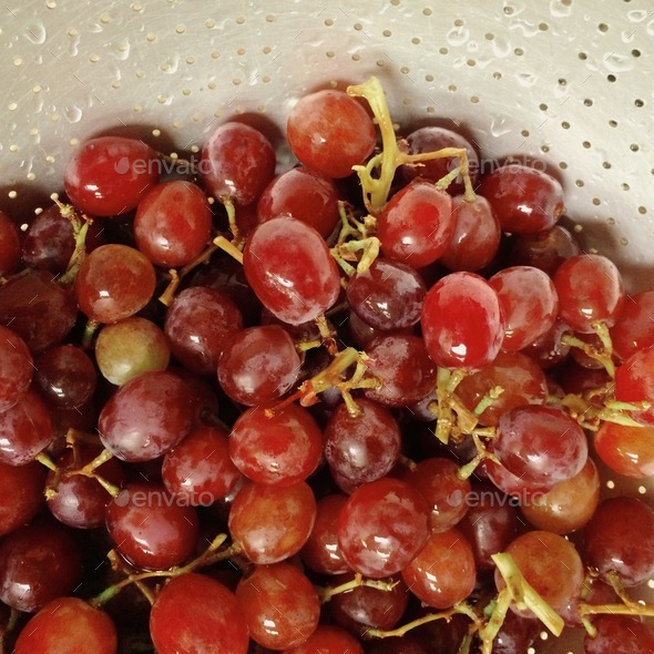Grapes in a strainer Stock Photo by naokawa PhotoDune