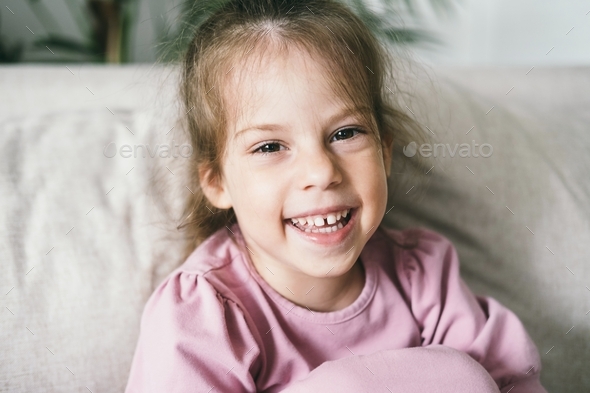 Portrait of a Blonde Girl with Blonde Hair. a Child Model Poses, Smiling  Stock Photo - Image of charming, joyful: 231441726
