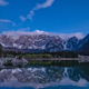 Stars and mountains reflection at lake Jasna at night - PhotoDune Item for Sale