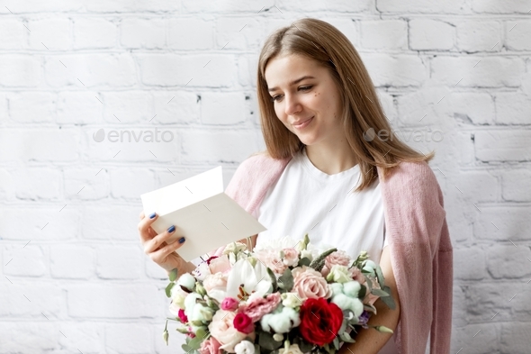 girl getting receiving congrats card birthday greetings big bouquet flowers