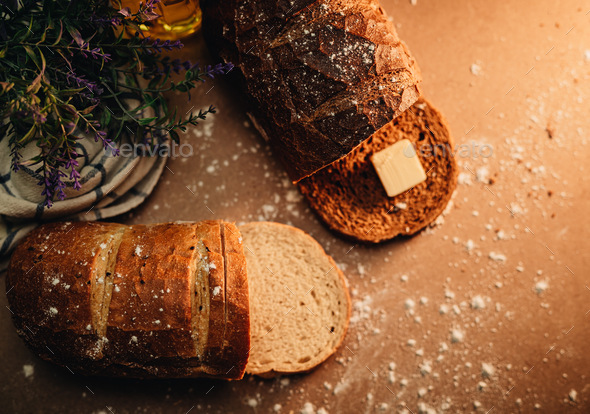 Close up of freshly baked artisan bread in kitchen at home  - Stock Photo - Images