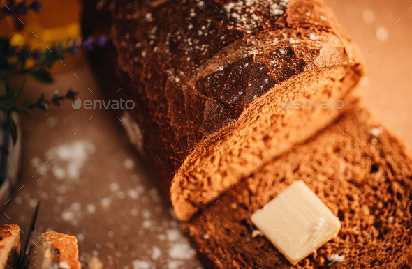 Close up of freshly baked artisan bread in kitchen at home  - Stock Photo - Images