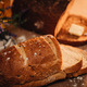 Close up of freshly baked artisan bread in kitchen at home  - PhotoDune Item for Sale