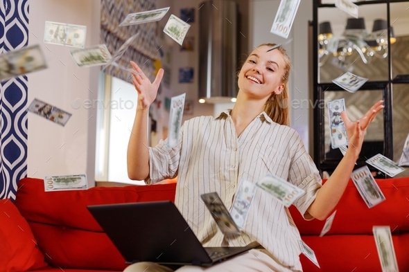 The girl made a lot of money online from home. Easy money concept