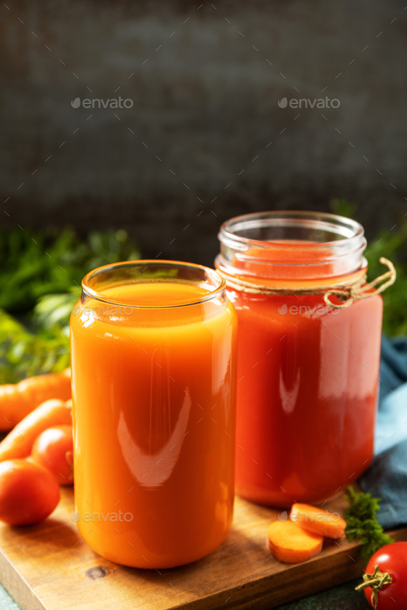 Vitamins drinks juice carrot and tomato, healthy lifestyle. Stock Photo