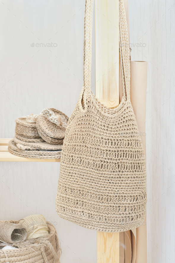 handmade knitted shoulder bag made of jute. boho eco shopper, - Stock Photo - Images