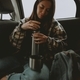 Girl having Coffee Time within a Car - PhotoDune Item for Sale
