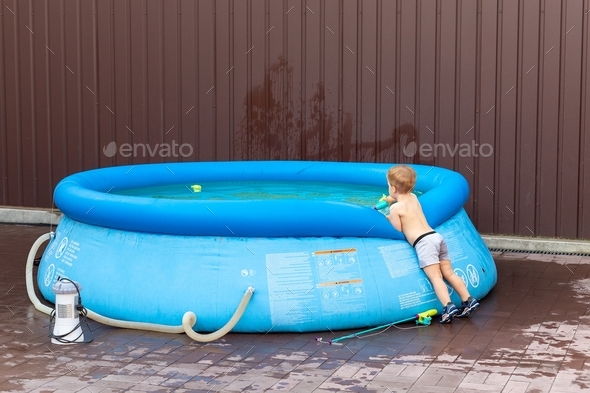 Cheerful Children Fishing Fishing Paddling Pool Stock Photo