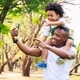 African American father and son selfie together. Father day concept - PhotoDune Item for Sale