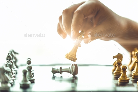 people playing chess for business winner game