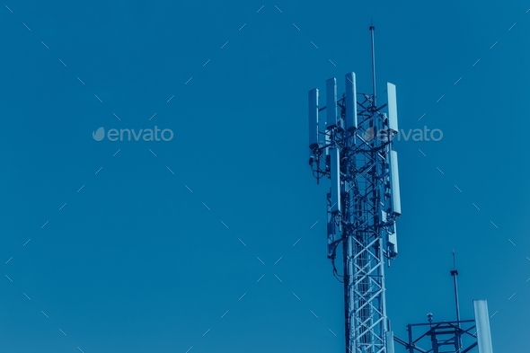 Mobile phone Signal tower cell site of Digital 4G Antenna blue color tone for high technology