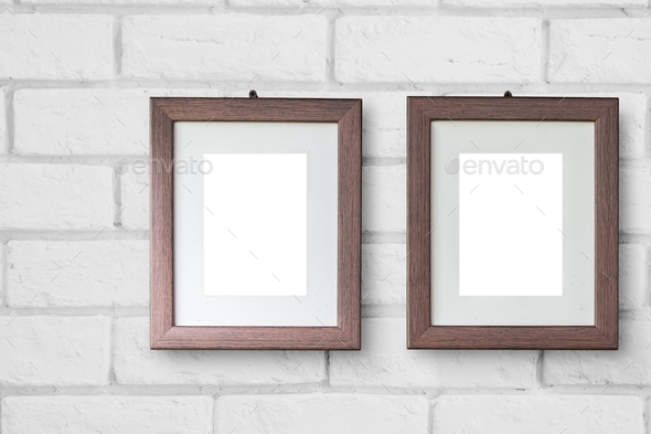 Beautiful two wooden picture frame hanging on white brick wall for couple lover photos minimal style