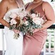 Bride and Matron of honour holding bouquets with pink flowers  - PhotoDune Item for Sale