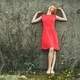 Beautiful young girl in a red dress. - PhotoDune Item for Sale