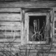 Sad woman face in an old window. Black and white photography. - PhotoDune Item for Sale