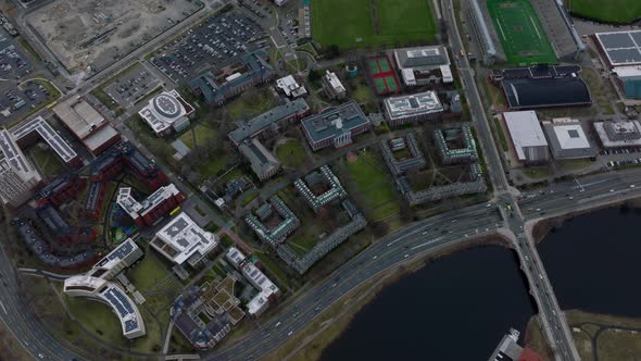 Cars Driving on Busy Multilane Road on Waterfront Around Harvard Business School Complex alt