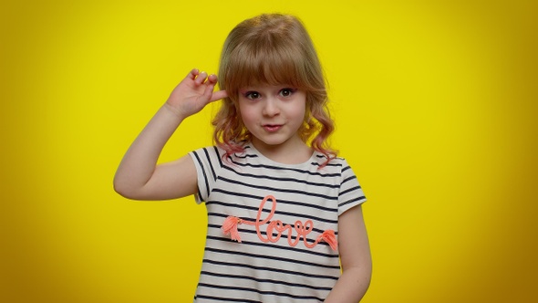 Kid Child Girl Pointing at Camera and Showing Stupid Gesture Blaming Some Idiot for Insane Plan alt