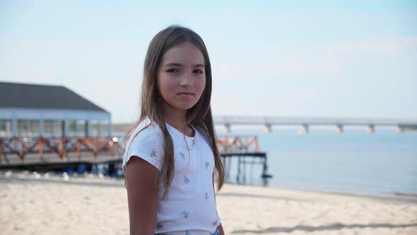 Child Smiles at Camera alt