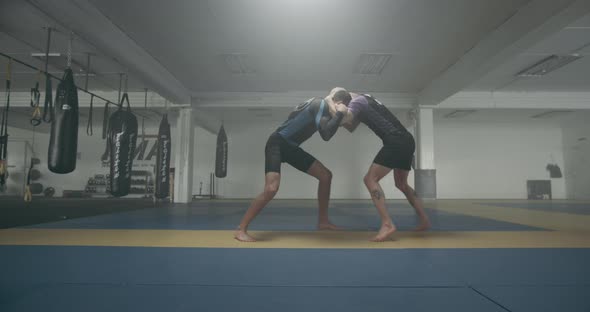 Mixed Martial Arts Fighters In Training Session alt