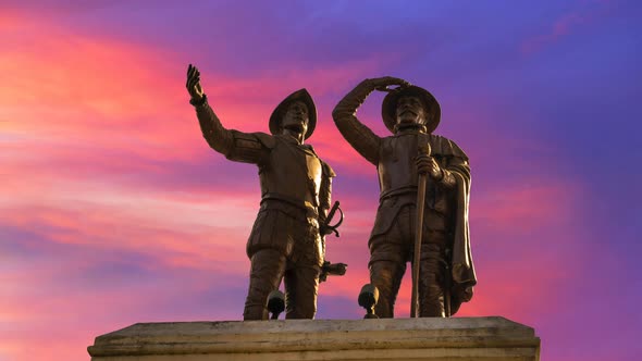 Looping time lapse of Francisco de Montejo monument in Merida, Mexico with a sunset pink sky. alt