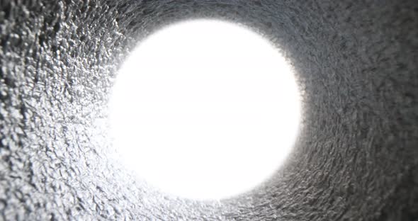Light at End of Tunnel or Pipe Closeup alt