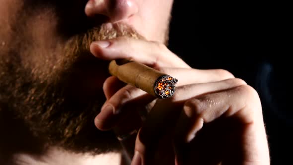 Smoking a Cigar. Close Up alt