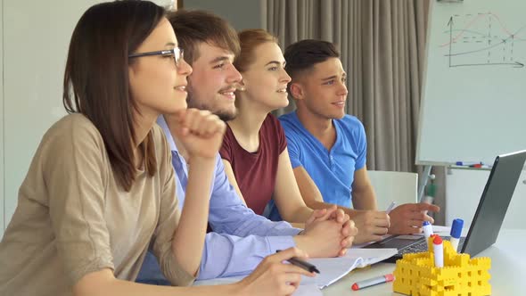 Creative Team Watches Some Presentation alt