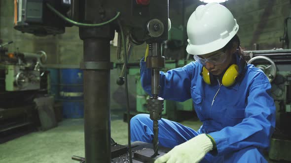 asian female Professional engineering wearing uniform and safety goggles alt