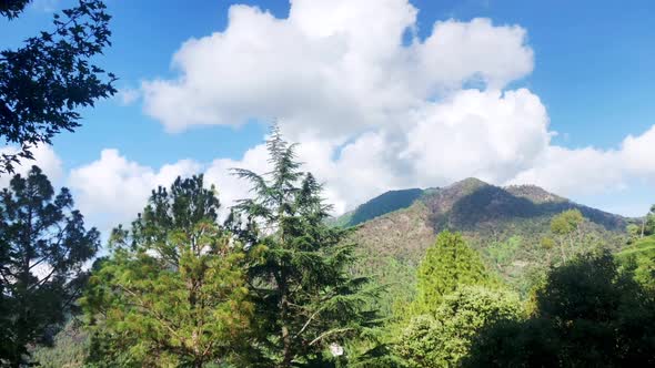 Clouds over mountain time-lapse