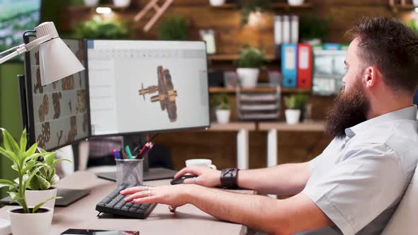 3D Designer Working on Some Prototipes in Creative Media House alt