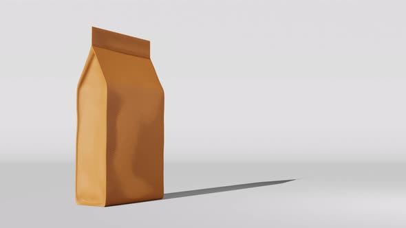 Golden standing box bottom pouch bag coffee branding 3D animation. Merchandise packaging desig 4K alt