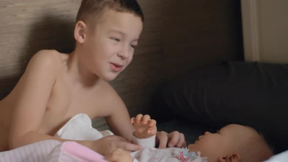 Boy is happy to have junior sister alt