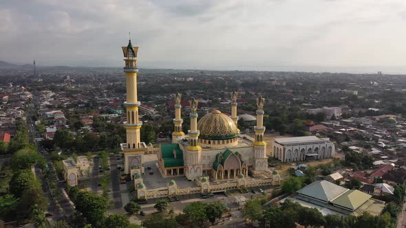 Exterior Of Islamic Center NTB With Mataram City At Daytime In Lombok, Indonesia. - aerial alt