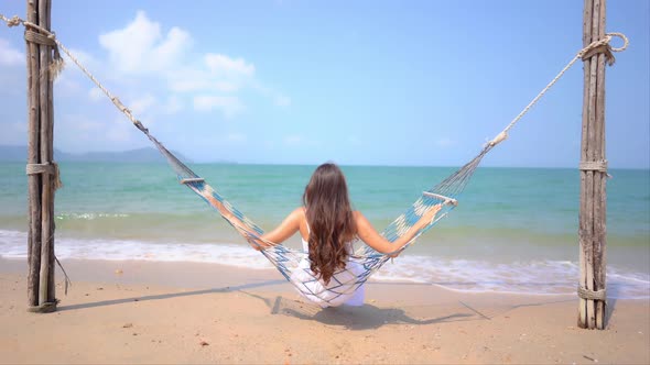 Asian woman enjoy around beautiful beach sea ocean alt