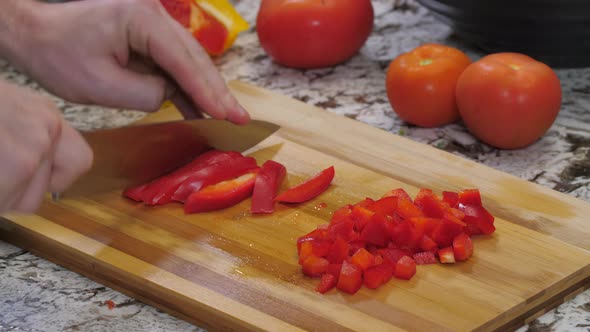 Dicing Red Peppers On Kitchen Wood Cutting Board 01