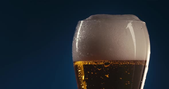 Refilling A Glass With Beer