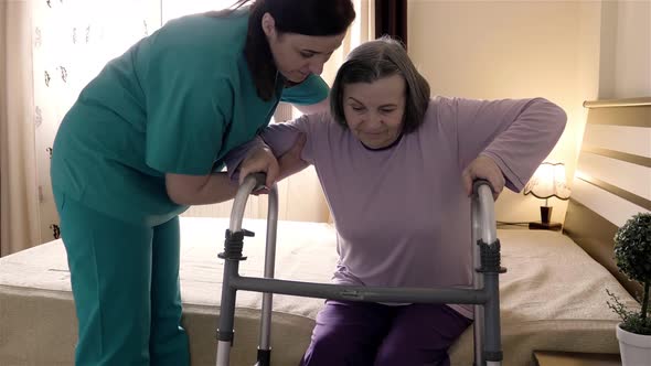 Nurse Caring Of Elder Disabled Woman Slow Motion