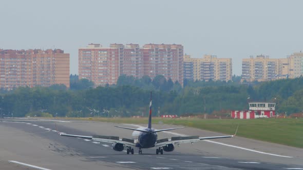 Plane Brakes After Landing Rear View alt