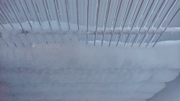 Defrost the freezer and refrigerator. Housekeeping, home keeping, house work, ice and frost, kitchen