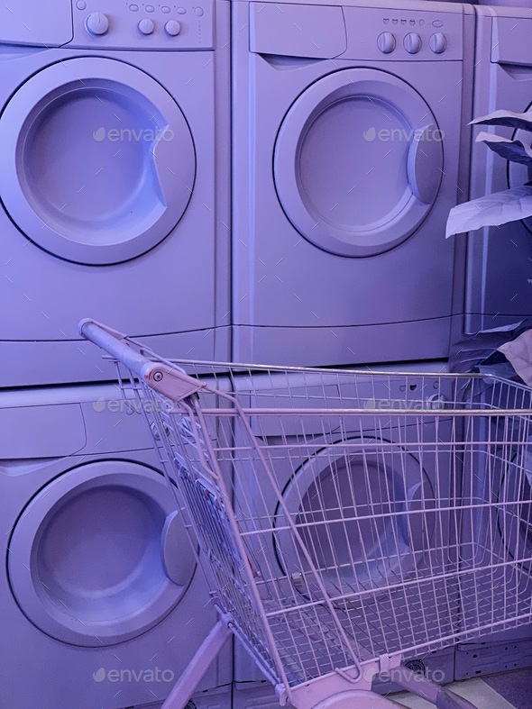 Purple laundry room. Washing mice, detergents all in one color Stock