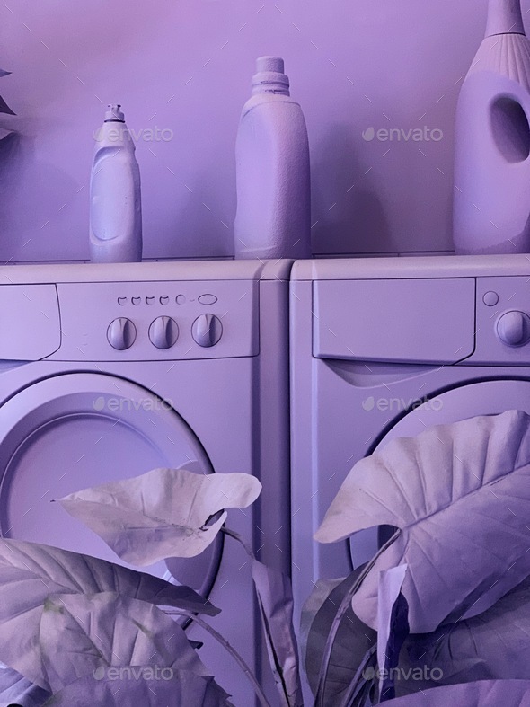 Purple laundry room. Washing mice, detergents all in one color Stock