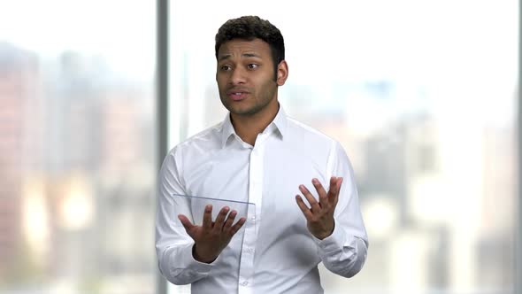 Business Man Speaker Working with Futuristic Digital Tablet. alt