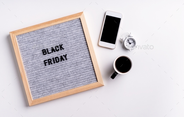 Black friday, seasonal sale concept. Text black friday on gray letter board on white background