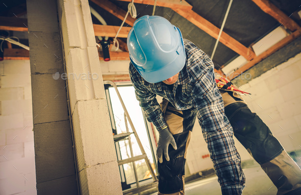 Contractor at the Construction Site - Stock Photo - Images